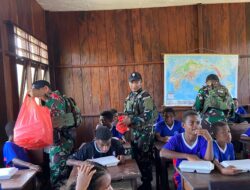 Satgas Yonif 642/Kps Berikan Makan Pagi Bergizi Gratis di SD Inpres Meyerga Papua Barat